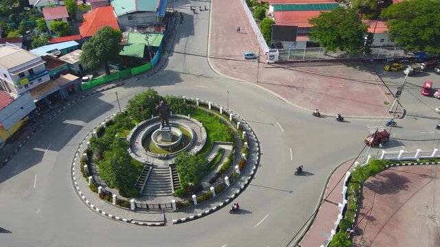 The landmark roundabout honoring Francisco Xavier do Amaral, the first president of Timor-Leste. An aerial view of the monument and traffic circle in the capital city of Dili.