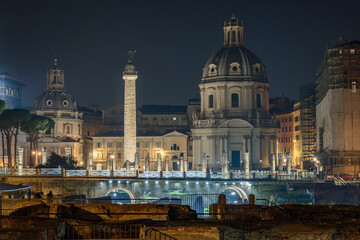 Trajan&rsquo;s Column and Church of the Most Holy Name of Mary at the Forum of Trajan Illuminated at Night in Rome