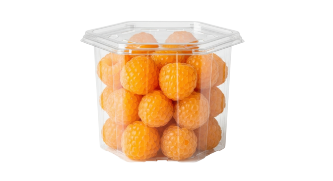 Isolated ripe golden raspberries in clear container, healthy snack with no background