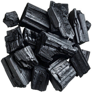 Close-up of rough, fragmented black tourmaline crystals piled together