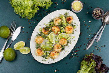 Scallops with a basil sauce.