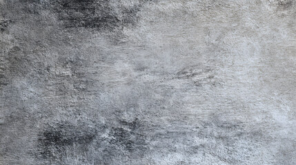 A textured gray background with a rough, abstract surface appearance