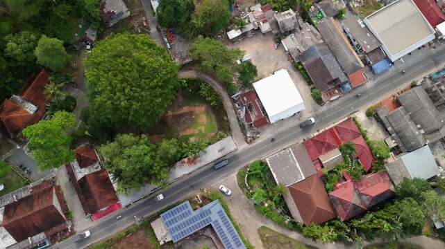 aerial top down drone footage of Koh Chang island, Kai Bae village with roads and traffic