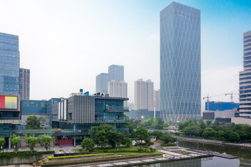 Fototapeta premium Captivating Urban Landscape with Modern Architecture and Serene Waterfront View