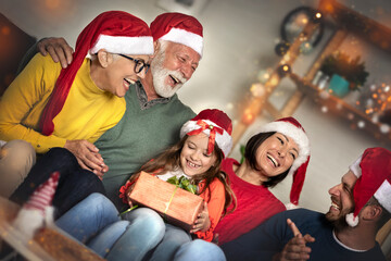 Happy family with Christmas gifts.