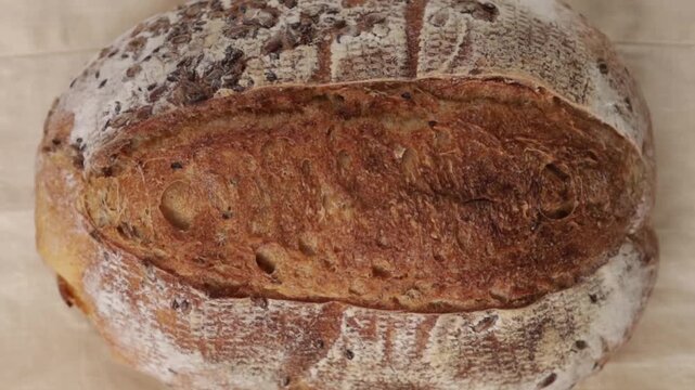 wholegrain sourdough bread on napkin zoom top view