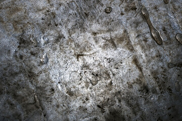 Mysterious abstract background with dark, rough, weathered metal texture. An industrial grunge...