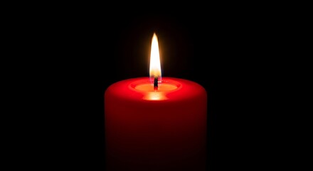 Red Candle Flame in Darkness - A Symbol of Hope.