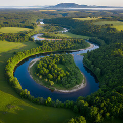 Scenic view of a river winding through green hills and trees in a bright landscape
