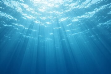 Obraz premium Ocean waves under sunlight, the natural texture and movement of clear blue seawater. Environmental themes, relaxation concepts, and nature backgrounds