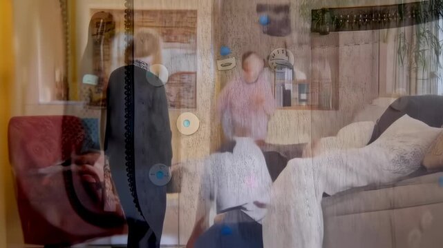 Close-up of a gray jacket with various buttons and a zipper, showcasing intricate details and texture.