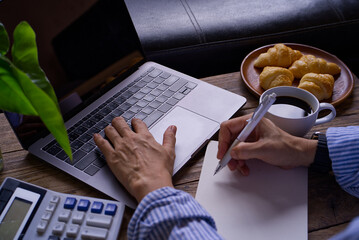 businessman working on laptop computer