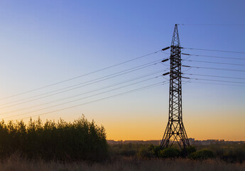 Power transmission tower at sunset