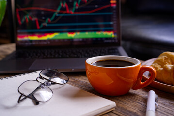 cup of coffee on the laptop