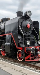 Fototapeta premium Steam Locomotive on Display - A Classic Train Engine in Detail.