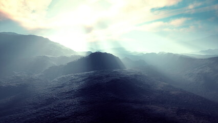 A stunning landscape reveals a vast mountain range under a gentle morning light. The clouds disperse as sunlight pierces through, creating an ethereal atmosphere and inviting tranquility.