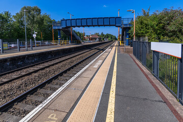 passenger urban commuter rural railway station england uk