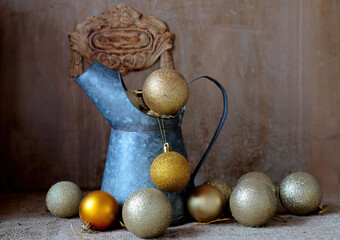 Old zinc jug and christmas balls 