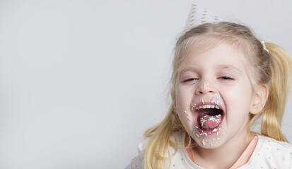Cute Little Birthday Girl with Colorful Sugar Sprinkles on Lips – Children and Sweet Addiction...