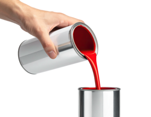 Hand pouring red paint from a can