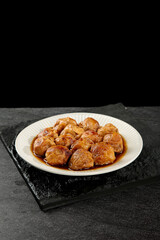 Braised Pork Belly Stuffed with Fish and Tofu in Savory Sauce - Traditional Asian Cuisine Dish