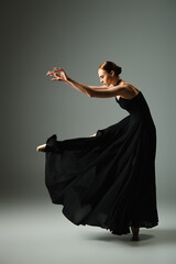 Elegant ballet dancer showcasing grace and beauty in motion during a performance © LIGHTFIELD STUDIOS