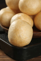 Traditional Steamed Buns in Black Serving Dish - Asian Cuisine Food Photography