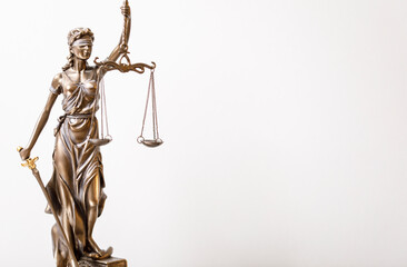 Themis, the goddess of justice, with her blindfold, scales, and sword, representing law, fairness,...