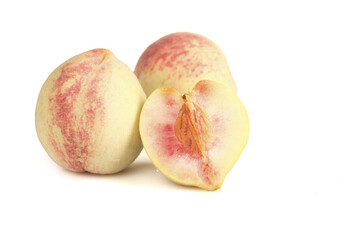 Fresh Ripe Peaches Whole and Cut in Half Isolated on White Background