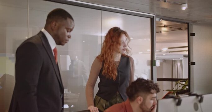 Business colleagues analyze marketing and revenue statistics, brainstorming ideas for profitability and small business growth. - Powered by Adobe