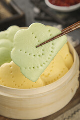 Traditional Lotus Leaf Shaped Steamed Cake with Chopsticks - Asian Gourmet Dessert
