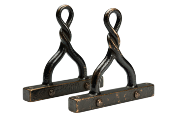 Pair of vintage wrought iron andirons for a fireplace isolated with transparent background