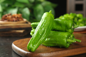 Fresh Green Tiger Peppers on Wooden Cutting Board - Farm Fresh Vegetables for Healthy Cooking