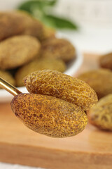 Dried Fruits and Mediterranean Olives on Wooden Spoon - Healthy Snack Food Photography