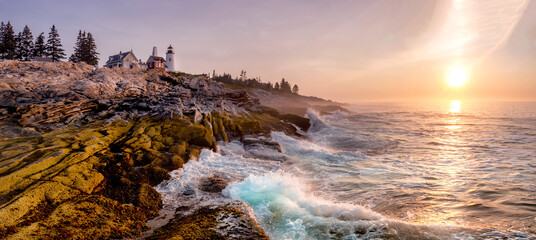 Lighthouse on the Coast at Sunrise. Pemaquid Point Light, Maine, USA.
