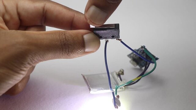 Simple electronic circuit that demonstrates the use of limit switch to turn the led light on and off connected to lithium polymer battery