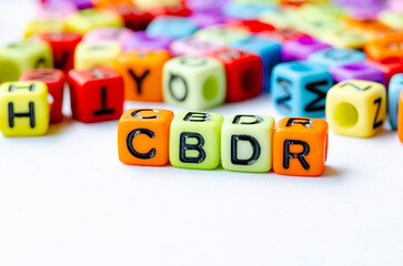 CBDR text on multicolored cubes representing Common But Differentiated Responsibilities. Conservation concept.