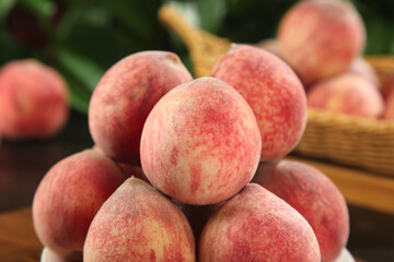 Fresh Ripe Peaches with Red Skin in Wooden Basket - Organic Stone Fruit Harvest
