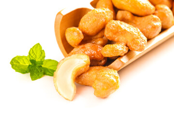 Salted Cashew Nuts in Wooden Bowl with Mint Leaf Garnish - Healthy Snack Food