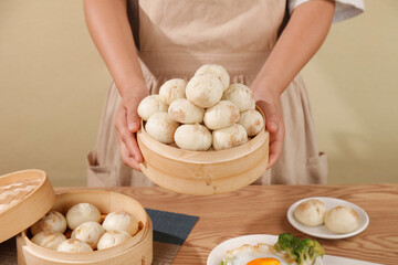 Fresh Homemade Dumplings in Bamboo Steamer - Traditional Asian Cooking and Food Preparation