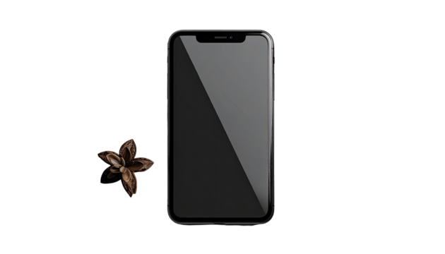 Smartphone with a dark background and a small object