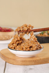 Japanese Natto Fermented Soybeans with Chopsticks - Traditional Asian Healthy Food
