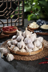 Fresh Shandong Garlic Bulbs from Chinese Farmers in Traditional Woven Basket Kitchen Display