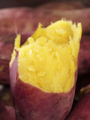 Hot Baked Sweet Potato with Steaming Yellow Flesh - Fresh Healthy Vegetable Food