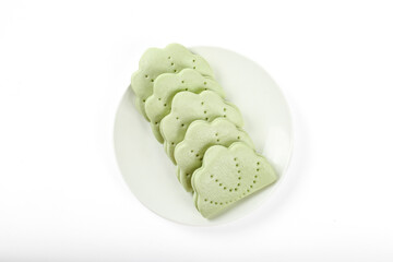 Green Lotus Leaf Shaped Asian Dessert Cakes on White Plate