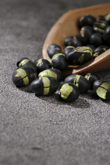 Black Beans with Green Hearts in Wooden Bowl - Healthy Legume Food Ingredient