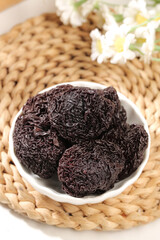 Yongtai Candied Dried Plums in Bowl with Hibiscus Flowers - Traditional Asian Fruit Snack