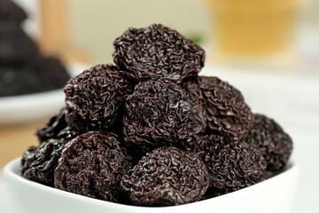 Dried Candied Plums in White Bowl - Traditional Yongtai Fruit Snack Preparation Tips