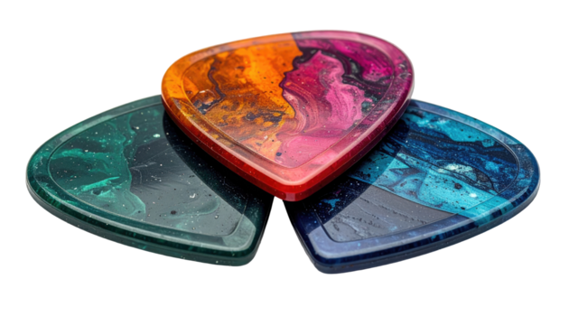 Three colorful guitar picks stacked