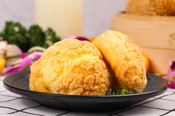 Golden Cream Puff Pastries on Black Plate - Delicious Bakery Dessert Food Photography